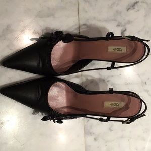 Prada black leather sling backs